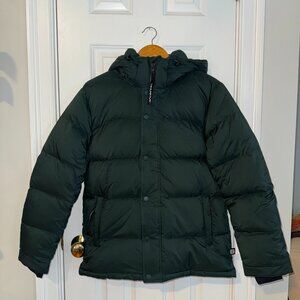 The Super Puff™ cliMATTE in size small, Scarab green